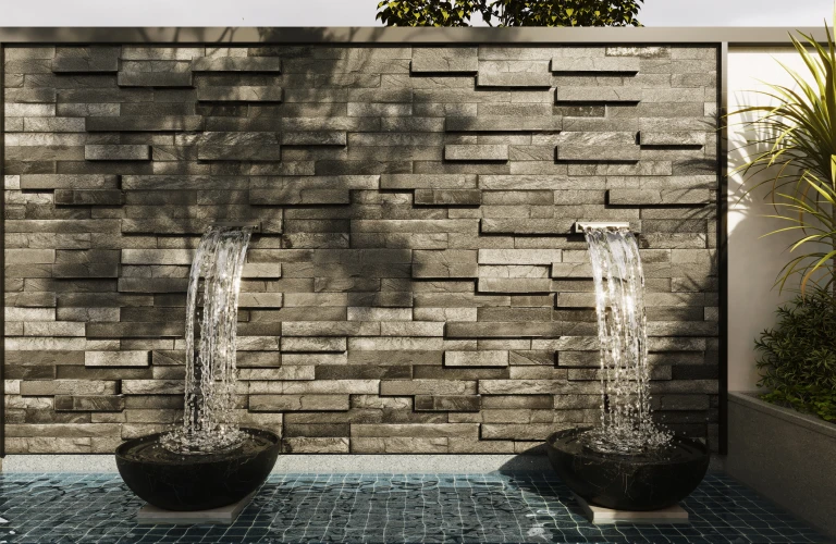 Garden water feature A fountain with water flowing out of it